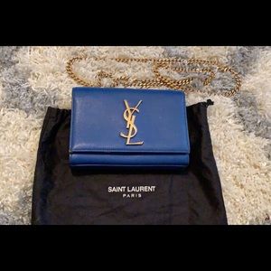 YSL wristlet crossbody.